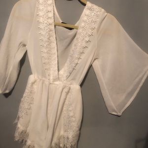 Sheer deep V white romper, lace detail,never worn